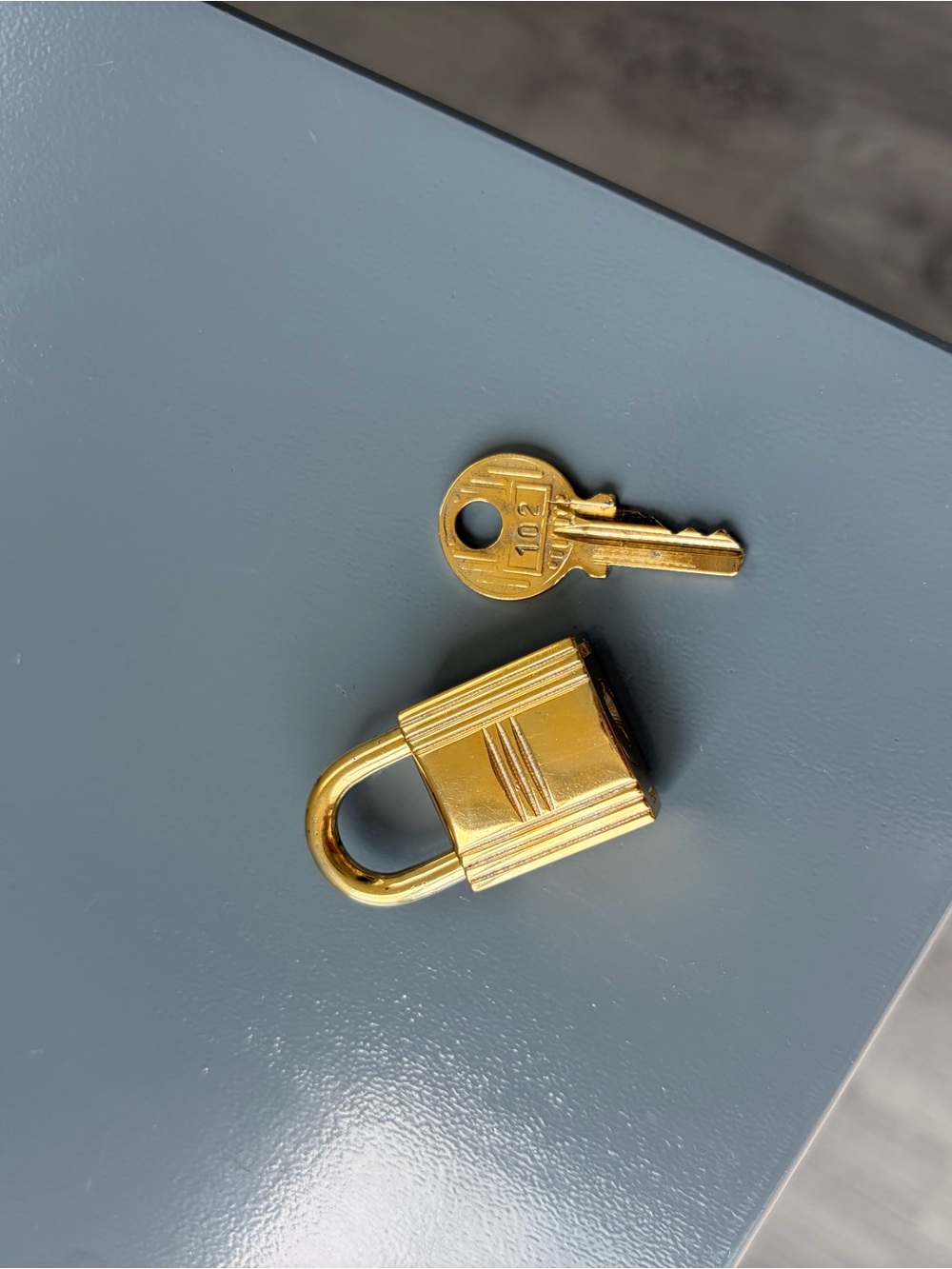 Hermes Gold-Tone Padlock and Key Keychain Accessory - Picture 2 of 6